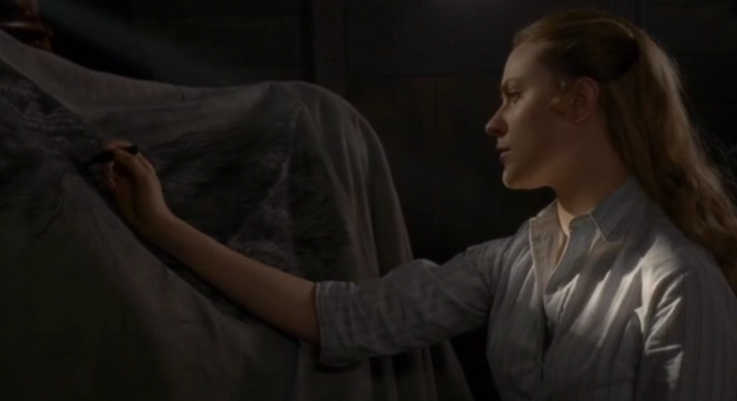 Still frame from Westworld — Dolores reaching out in warm morning light