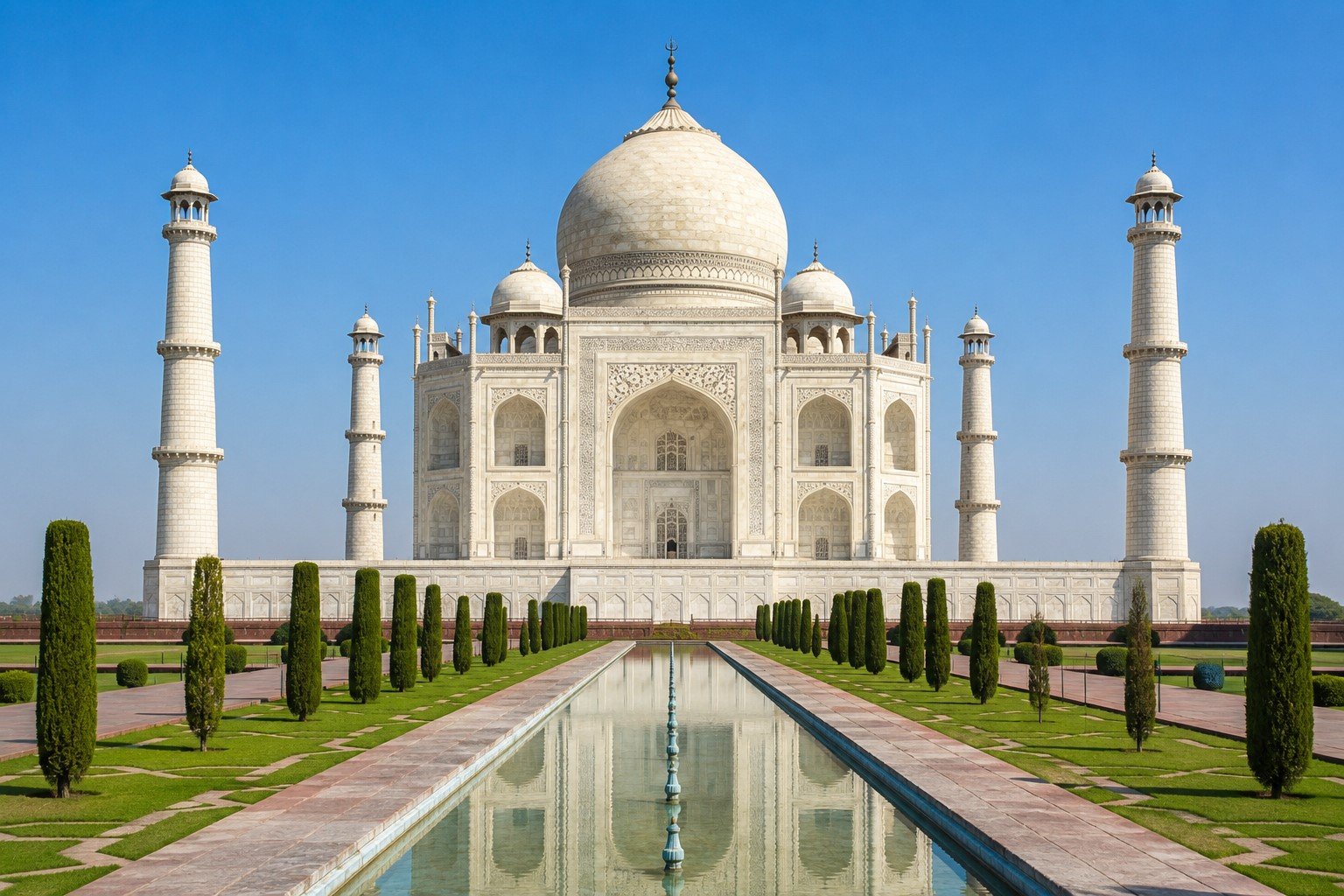 The white marble mausoleum and its reflecting pool